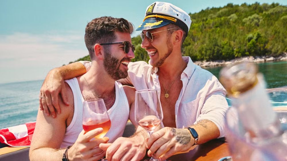 Two travelers laughing on a boat day